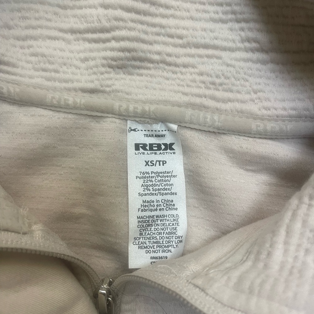 RBX XS TP actually fits small as well. Great condition sweatshirt with snaps
